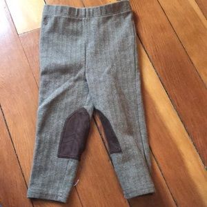 Brown houndstooth ridding pants.